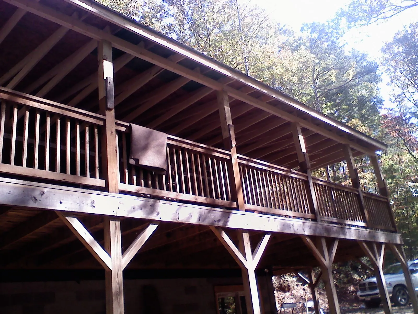 Timber framing under a new elevated porch and deck — Roof Leak Repair in Madison Lake by Roofing Brothers